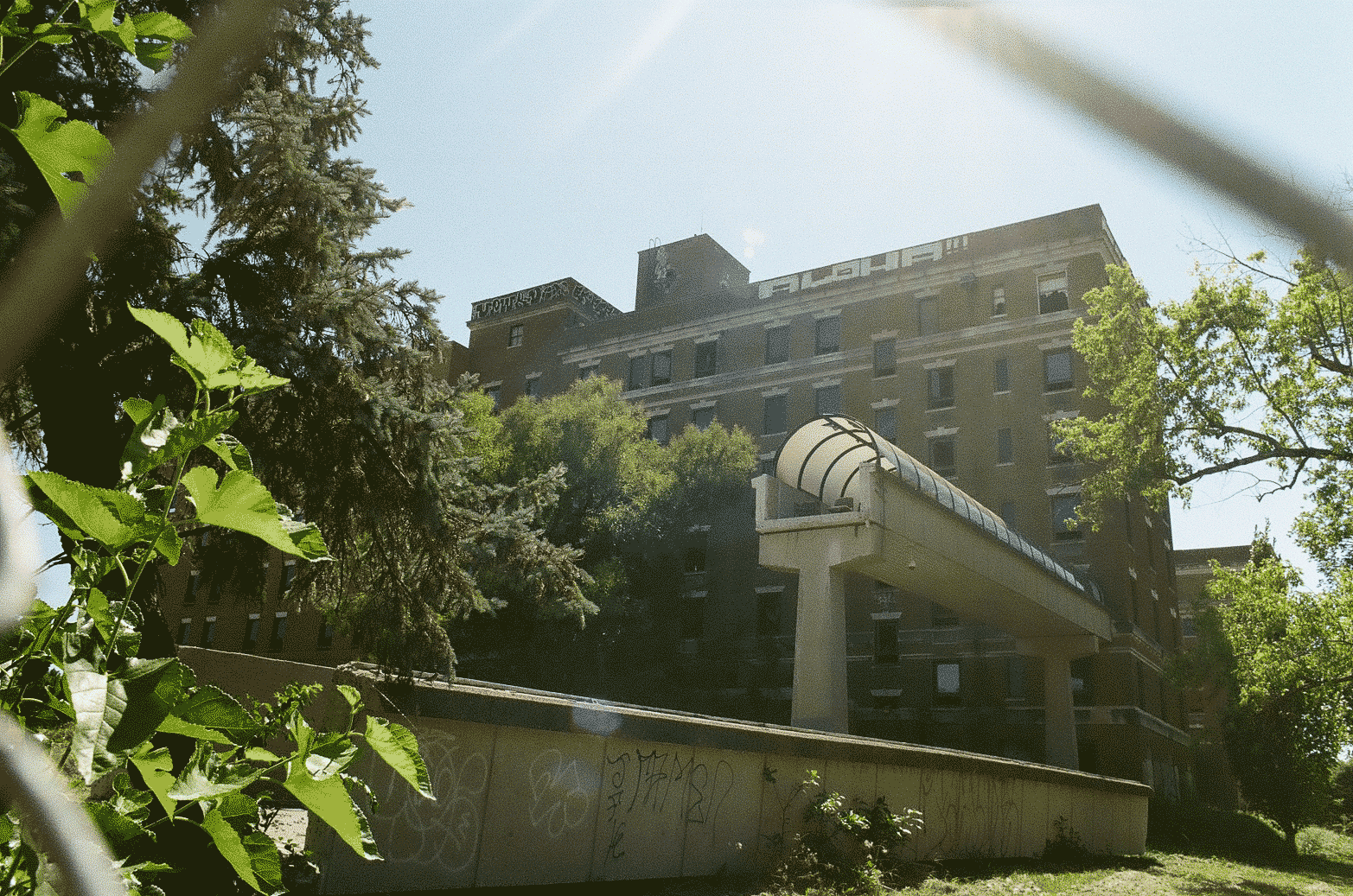 Photo of abandoned hospital with transport tube broken